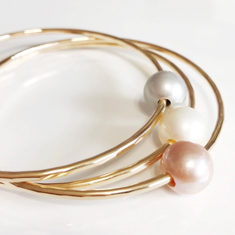 SOLD Pearl bangle set